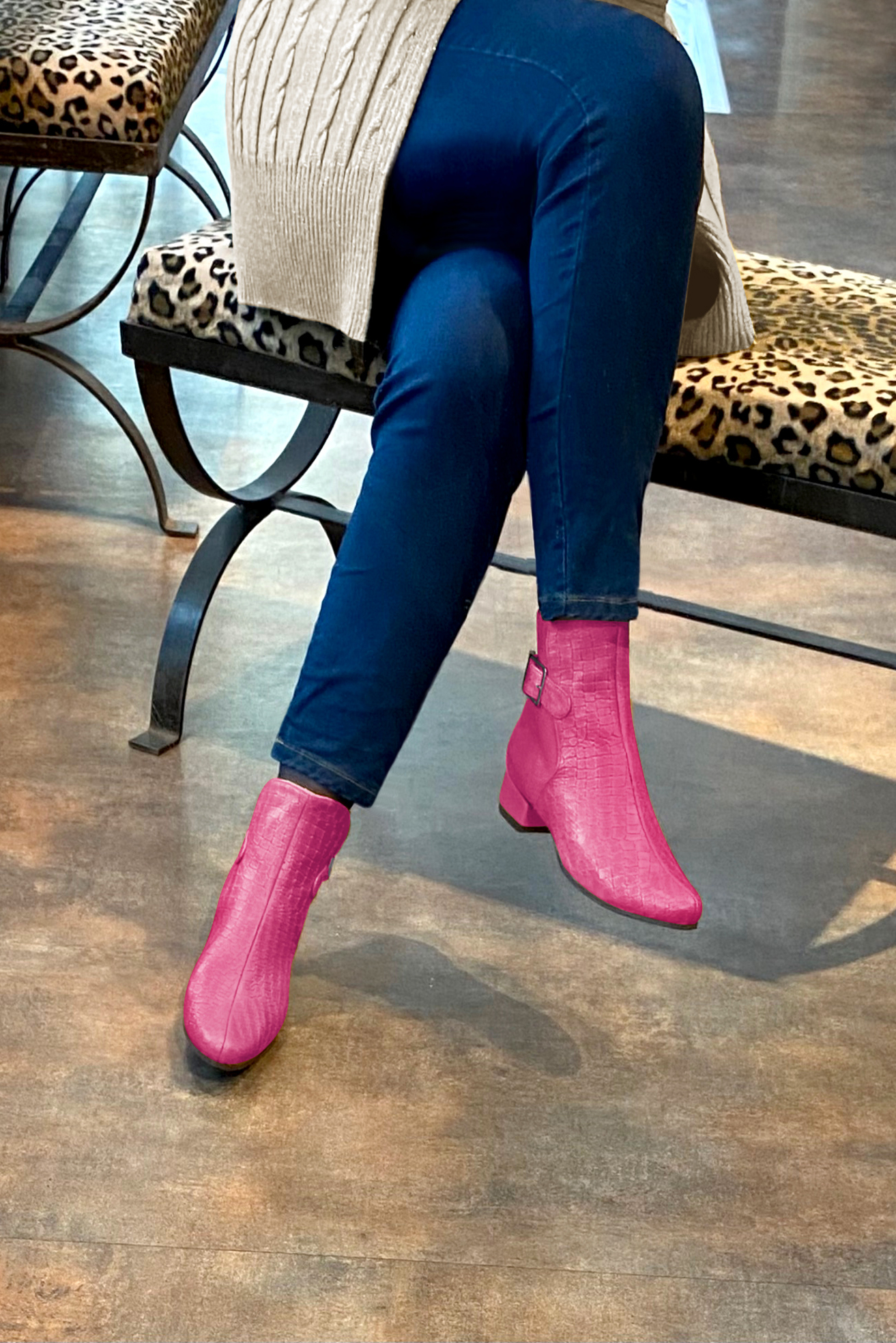 Fuschia pink women's ankle boots with buckles at the back. Round toe. Low block heels. Worn view - Florence KOOIJMAN